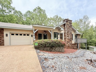 Enclosed glass sunroom offers year-round enjoyment from this on Cortez Golf Course in Arkansas - for sale on GolfHomes.com, golf home, golf lot