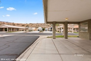 Take a look at this charming 1,063 sq. ft. home located in the on Beaver Dam Resort in Arizona - for sale on GolfHomes.com, golf home, golf lot
