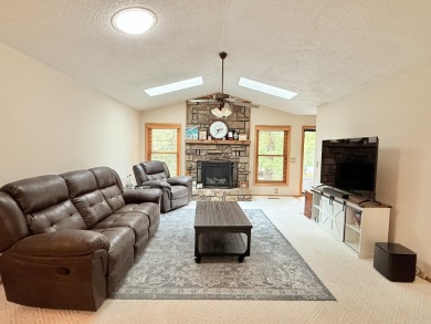 Enclosed glass sunroom offers year-round enjoyment from this on Cortez Golf Course in Arkansas - for sale on GolfHomes.com, golf home, golf lot