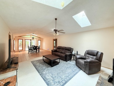 Enclosed glass sunroom offers year-round enjoyment from this on Cortez Golf Course in Arkansas - for sale on GolfHomes.com, golf home, golf lot