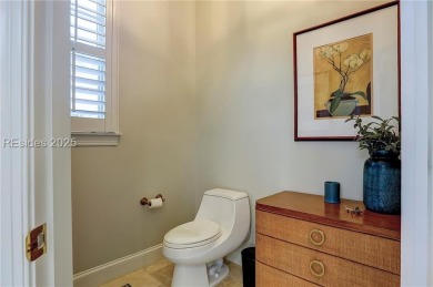 Experience refined living in this beautifully updated home on Colleton River Plantation Club in South Carolina - for sale on GolfHomes.com, golf home, golf lot