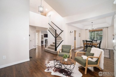 Enjoy the charm of shady, tree-lined streets as you arrive at on Pelican Lakes Golf and Country Club in Colorado - for sale on GolfHomes.com, golf home, golf lot