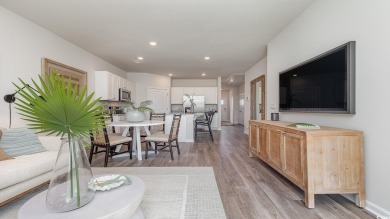 This home features 2 bedrooms and a flex room with french doors on Brunswick Plantation and Golf Resorts in North Carolina - for sale on GolfHomes.com, golf home, golf lot