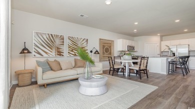 This home features 2 bedrooms and a flex room with french doors on Brunswick Plantation and Golf Resorts in North Carolina - for sale on GolfHomes.com, golf home, golf lot