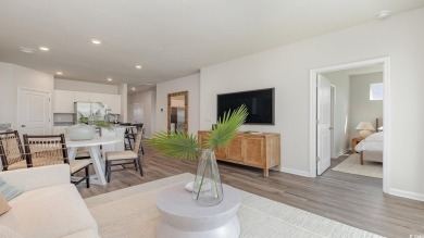This home features 2 bedrooms and a flex room with french doors on Brunswick Plantation and Golf Resorts in North Carolina - for sale on GolfHomes.com, golf home, golf lot