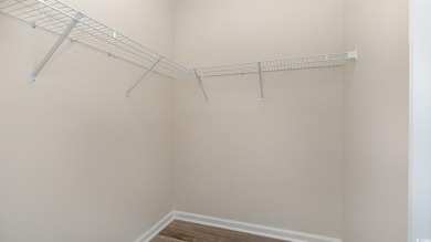 This home features 2 bedrooms and a flex room with french doors on Brunswick Plantation and Golf Resorts in North Carolina - for sale on GolfHomes.com, golf home, golf lot