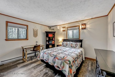 Unwind from a busy life to 1266 Longrifle. Sharing the relaxed on Lake Naomi Timber Trails Golf Club in Pennsylvania - for sale on GolfHomes.com, golf home, golf lot