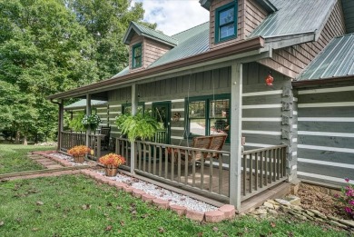 The essence of Tennessee Living! Honest Abe Log Home perched on on Hidden Valley Golf and Country Club in Tennessee - for sale on GolfHomes.com, golf home, golf lot