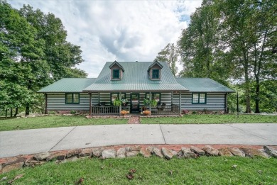 The essence of Tennessee Living! Honest Abe Log Home perched on on Hidden Valley Golf and Country Club in Tennessee - for sale on GolfHomes.com, golf home, golf lot