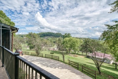 The essence of Tennessee Living! Honest Abe Log Home perched on on Hidden Valley Golf and Country Club in Tennessee - for sale on GolfHomes.com, golf home, golf lot
