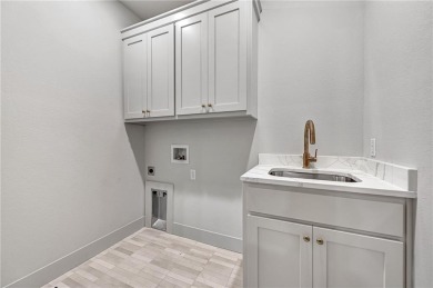 Welcome home to stunning new construction in Bella Vista. This on Bella Vista - Metfield Golf Complex and Country Club in Arkansas - for sale on GolfHomes.com, golf home, golf lot