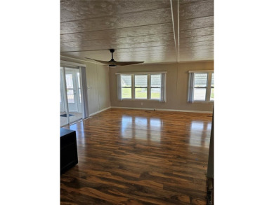 This home is seeking someone to complete the repairs and restore on Pelican Pointe Golf and Country Club in Florida - for sale on GolfHomes.com, golf home, golf lot