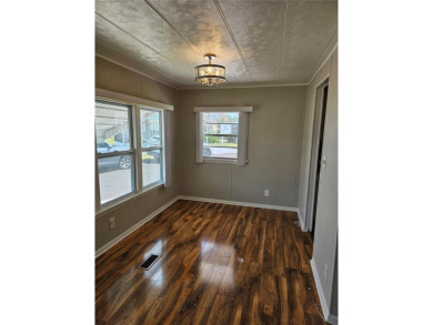 This home is seeking someone to complete the repairs and restore on Pelican Pointe Golf and Country Club in Florida - for sale on GolfHomes.com, golf home, golf lot