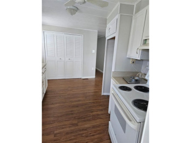 This home is seeking someone to complete the repairs and restore on Pelican Pointe Golf and Country Club in Florida - for sale on GolfHomes.com, golf home, golf lot