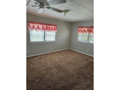 This home is seeking someone to complete the repairs and restore on Pelican Pointe Golf and Country Club in Florida - for sale on GolfHomes.com, golf home, golf lot