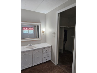 This home is seeking someone to complete the repairs and restore on Pelican Pointe Golf and Country Club in Florida - for sale on GolfHomes.com, golf home, golf lot