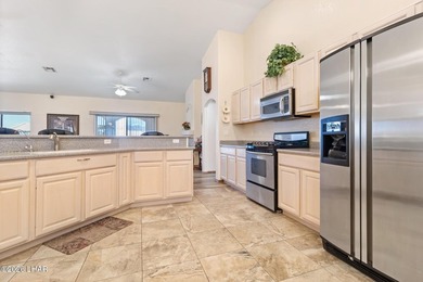 Welcome to this beautifully maintained 3-bedroom, 2-bath home on Desert Lakes Golf Course in Arizona - for sale on GolfHomes.com, golf home, golf lot