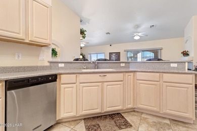 Welcome to this beautifully maintained 3-bedroom, 2-bath home on Desert Lakes Golf Course in Arizona - for sale on GolfHomes.com, golf home, golf lot