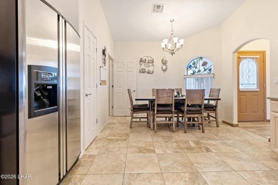 Welcome to this beautifully maintained 3-bedroom, 2-bath home on Desert Lakes Golf Course in Arizona - for sale on GolfHomes.com, golf home, golf lot