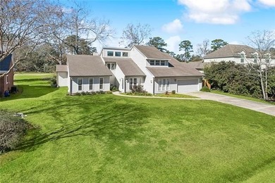 Fairway views, modern updates, and a peaceful setting on a quiet on Beau Chene Country Club in Louisiana - for sale on GolfHomes.com, golf home, golf lot