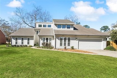 Fairway views, modern updates, and a peaceful setting on a quiet on Beau Chene Country Club in Louisiana - for sale on GolfHomes.com, golf home, golf lot