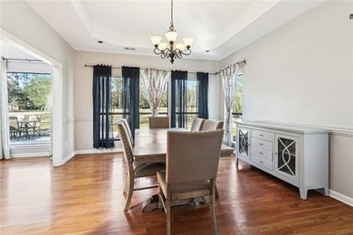 Fairway views, modern updates, and a peaceful setting on a quiet on Beau Chene Country Club in Louisiana - for sale on GolfHomes.com, golf home, golf lot