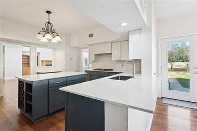 Fairway views, modern updates, and a peaceful setting on a quiet on Beau Chene Country Club in Louisiana - for sale on GolfHomes.com, golf home, golf lot