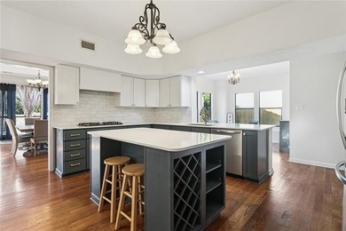 Fairway views, modern updates, and a peaceful setting on a quiet on Beau Chene Country Club in Louisiana - for sale on GolfHomes.com, golf home, golf lot