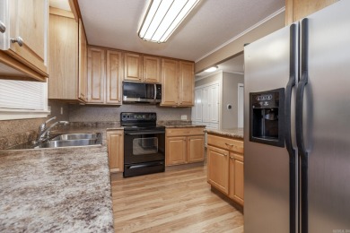 Immaculate updated ranch boasting 3 bedrooms, plus craft room on DeSoto Golf Course in Arkansas - for sale on GolfHomes.com, golf home, golf lot
