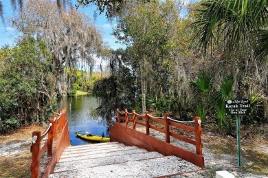 Under contract-accepting backup offers. This spacious lakefront on University Park Country Club in Florida - for sale on GolfHomes.com, golf home, golf lot