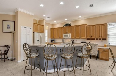 Under contract-accepting backup offers. This spacious lakefront on University Park Country Club in Florida - for sale on GolfHomes.com, golf home, golf lot