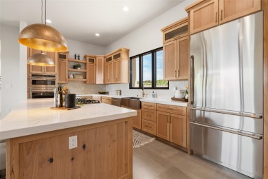 Nestled in the prestigious community of Las Campanas, 64 Calle on The Club At Las Campanas  in New Mexico - for sale on GolfHomes.com, golf home, golf lot