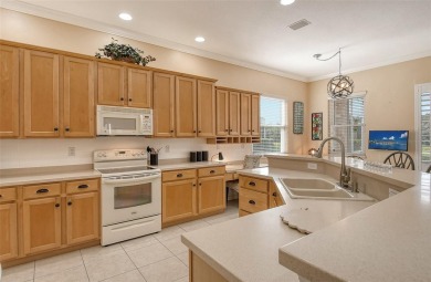 Under contract-accepting backup offers. This spacious lakefront on University Park Country Club in Florida - for sale on GolfHomes.com, golf home, golf lot