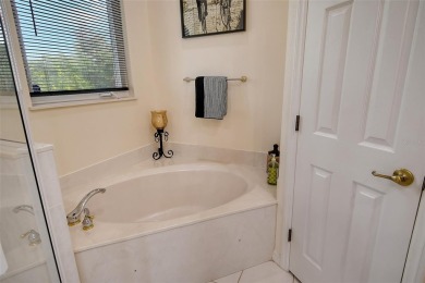 Under contract-accepting backup offers. This spacious lakefront on University Park Country Club in Florida - for sale on GolfHomes.com, golf home, golf lot