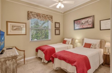 Under contract-accepting backup offers. This spacious lakefront on University Park Country Club in Florida - for sale on GolfHomes.com, golf home, golf lot