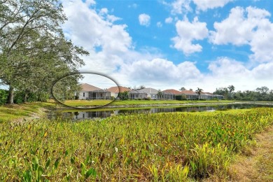 Under contract-accepting backup offers. This spacious lakefront on University Park Country Club in Florida - for sale on GolfHomes.com, golf home, golf lot