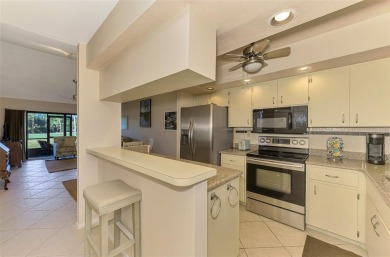 END UNIT WITH NOONE LIVING ABOVE YOU OR BELOW YOU!  Lives like a on Capri Isle Golf Club in Florida - for sale on GolfHomes.com, golf home, golf lot