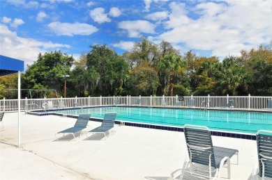 Under contract-accepting backup offers. This spacious lakefront on University Park Country Club in Florida - for sale on GolfHomes.com, golf home, golf lot