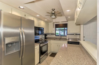 END UNIT WITH NOONE LIVING ABOVE YOU OR BELOW YOU!  Lives like a on Capri Isle Golf Club in Florida - for sale on GolfHomes.com, golf home, golf lot