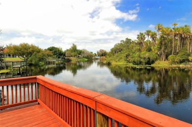 Under contract-accepting backup offers. This spacious lakefront on University Park Country Club in Florida - for sale on GolfHomes.com, golf home, golf lot