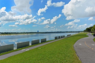 Under contract-accepting backup offers. This spacious lakefront on University Park Country Club in Florida - for sale on GolfHomes.com, golf home, golf lot