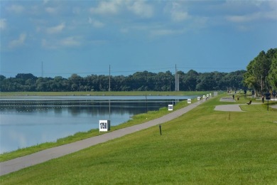 Under contract-accepting backup offers. This spacious lakefront on University Park Country Club in Florida - for sale on GolfHomes.com, golf home, golf lot