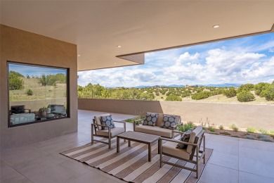 Nestled in the prestigious community of Las Campanas, 64 Calle on The Club At Las Campanas  in New Mexico - for sale on GolfHomes.com, golf home, golf lot