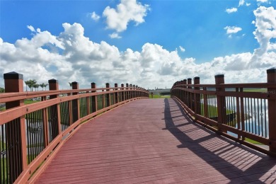 Under contract-accepting backup offers. This spacious lakefront on University Park Country Club in Florida - for sale on GolfHomes.com, golf home, golf lot