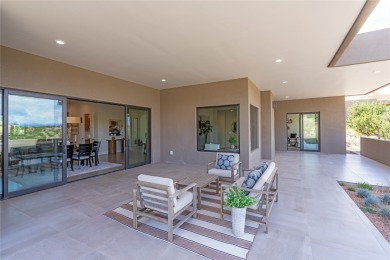 Nestled in the prestigious community of Las Campanas, 64 Calle on The Club At Las Campanas  in New Mexico - for sale on GolfHomes.com, golf home, golf lot