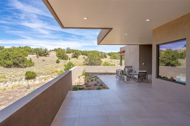 Nestled in the prestigious community of Las Campanas, 64 Calle on The Club At Las Campanas  in New Mexico - for sale on GolfHomes.com, golf home, golf lot