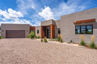 Nestled in the prestigious community of Las Campanas, 64 Calle on The Club At Las Campanas  in New Mexico - for sale on GolfHomes.com, golf home, golf lot