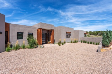 Nestled in the prestigious community of Las Campanas, 64 Calle on The Club At Las Campanas  in New Mexico - for sale on GolfHomes.com, golf home, golf lot
