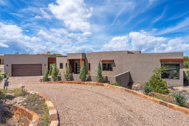 Nestled in the prestigious community of Las Campanas, 64 Calle on The Club At Las Campanas  in New Mexico - for sale on GolfHomes.com, golf home, golf lot