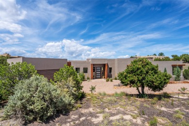 Nestled in the prestigious community of Las Campanas, 64 Calle on The Club At Las Campanas  in New Mexico - for sale on GolfHomes.com, golf home, golf lot